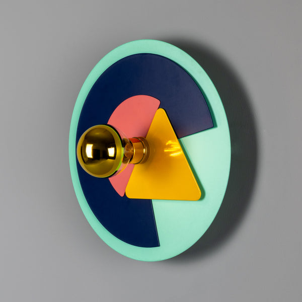 Mullan Earth colourful disc wall light with geometric shapes and a polished brass bulb