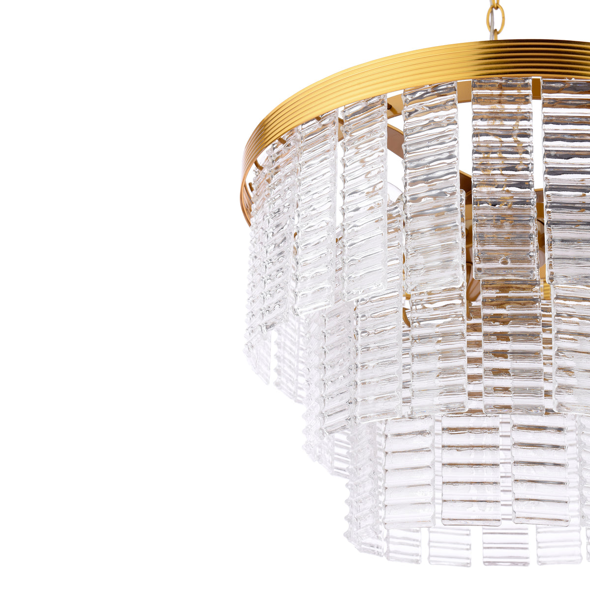 Close up of a gold chandelier with clear glass panels