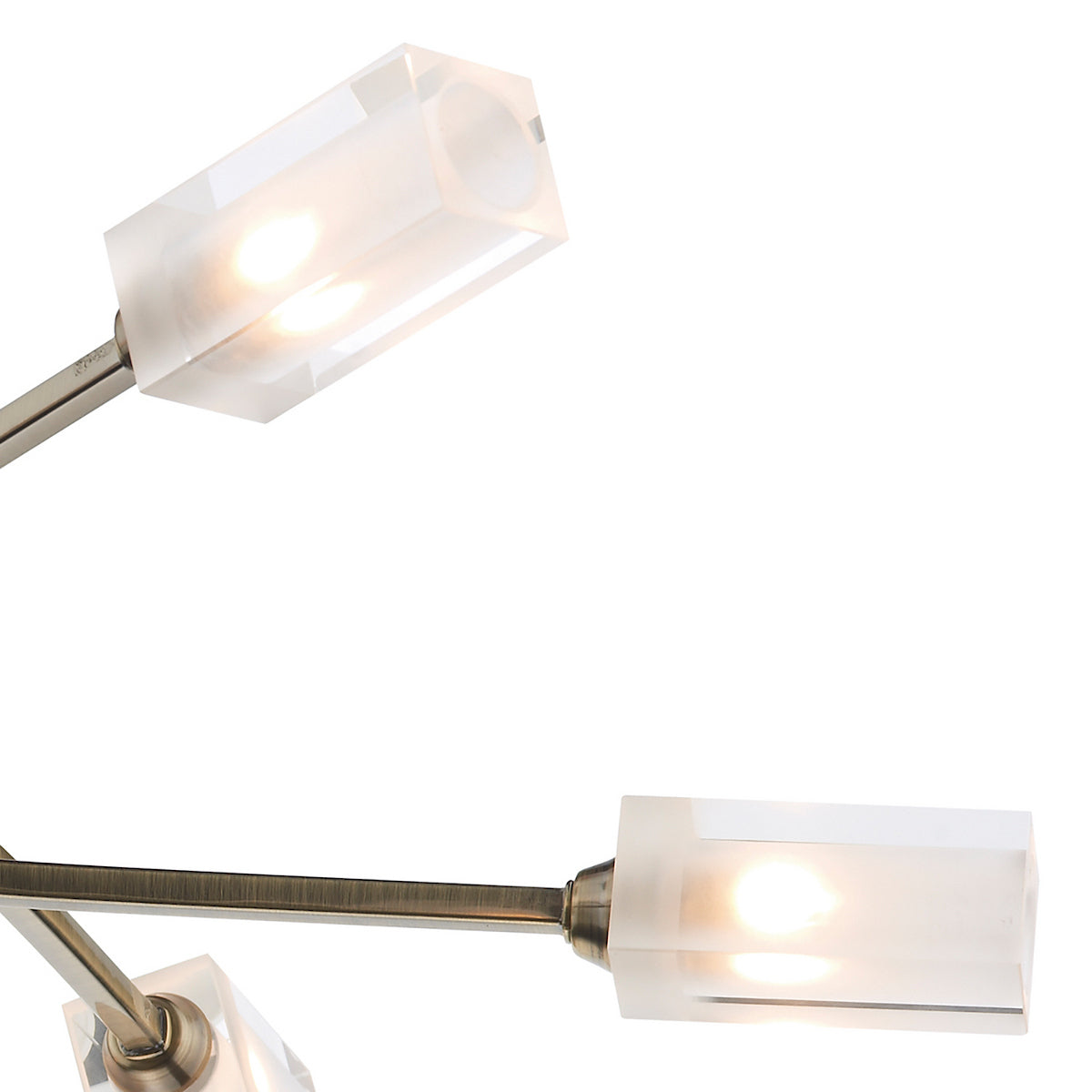 Close-up of a modern chandelier with rectangular frosted glass shades and brushed metal arms.