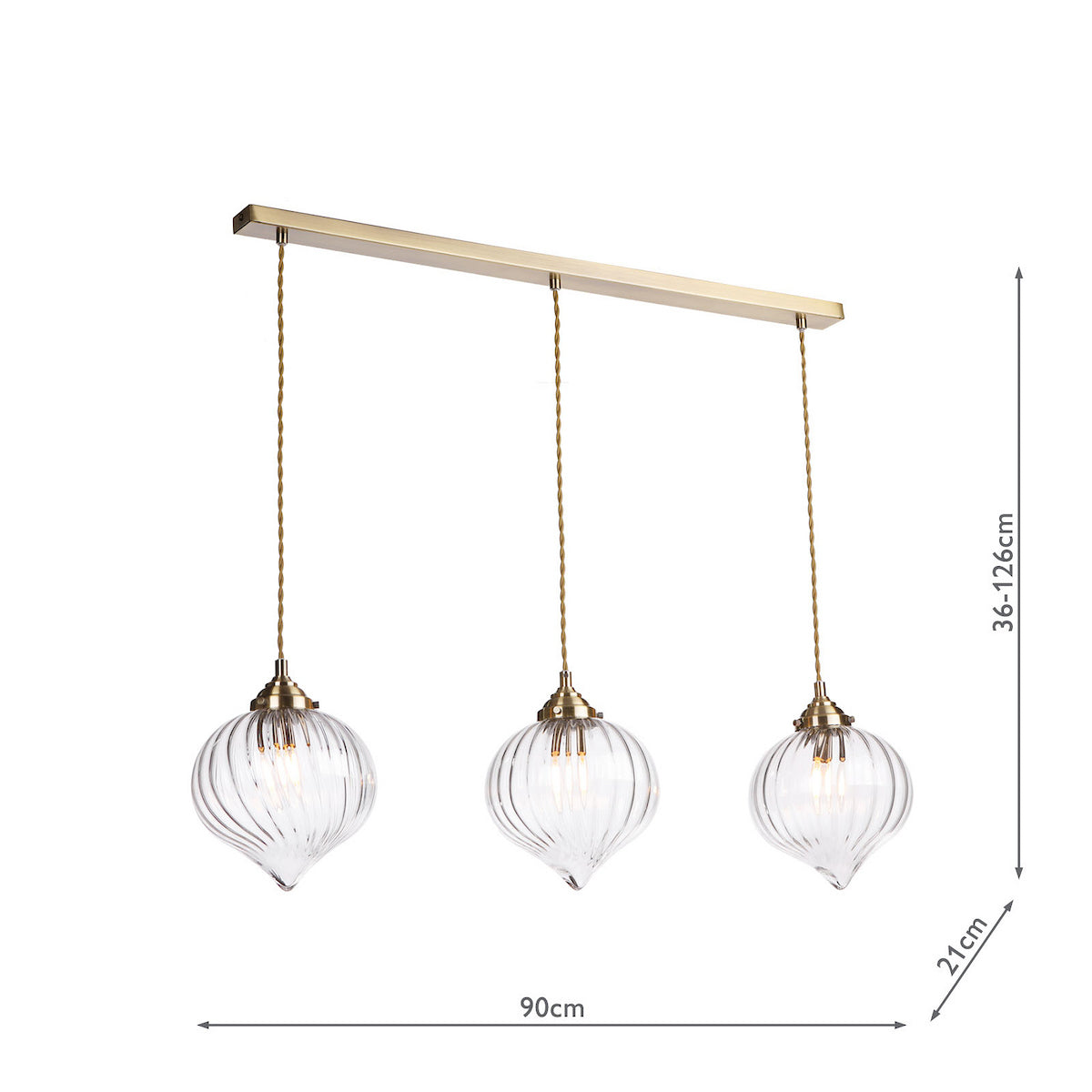 Three clear glass pendant lights with brass fittings hang from a brass bar.