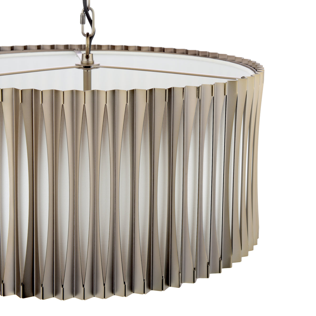 Close-up of a pendant light with a pleated metal shade and a white diffuser
