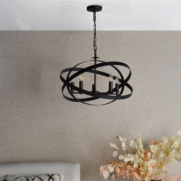 Black orb chandelier with exposed bulbs hanging from a white ceiling above a textured wall.