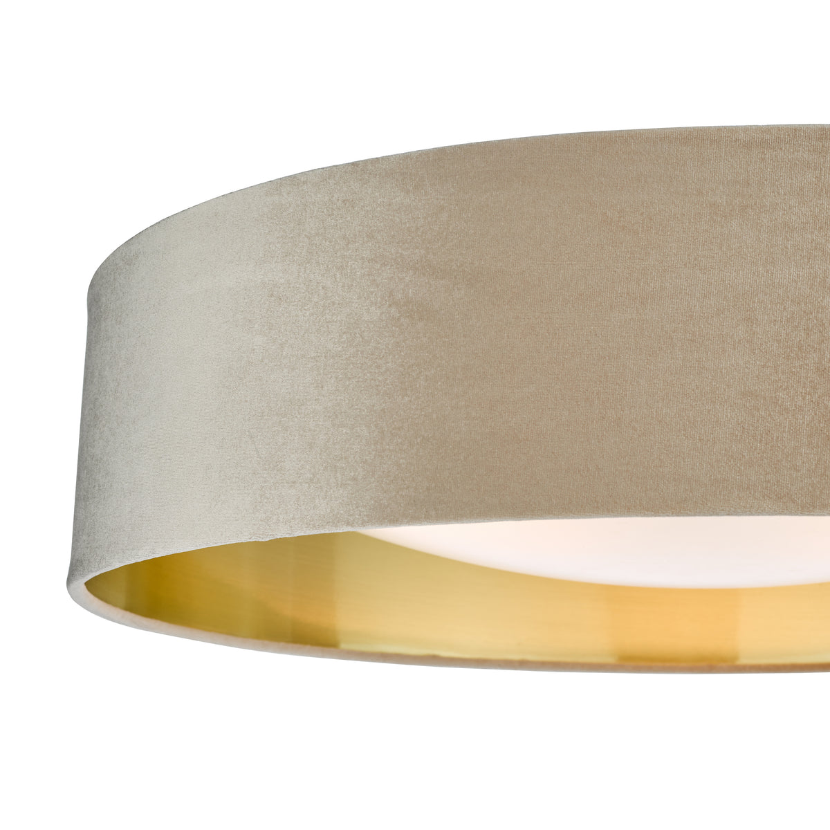 Close-up of a round ceiling light with a beige velvet shade and a gold interior