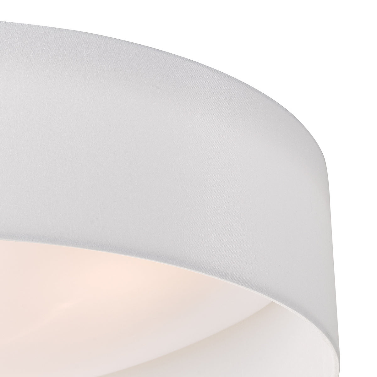 Close up of a white ceiling light with a fabric shade