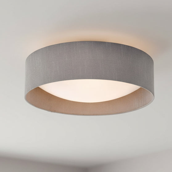 Round grey fabric ceiling light with a white diffuser