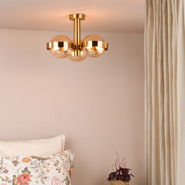 Ophira Three Light Semi Flush Ceiling Light In Antique Gold with Amber Ribbed Glass Shades