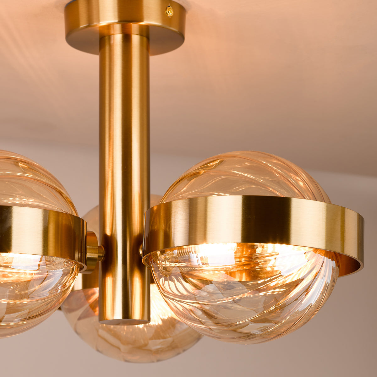 Ophira Three Light Semi Flush Ceiling Light In Antique Gold with Amber Ribbed Glass Shades