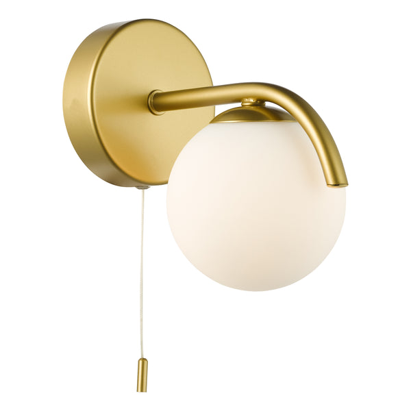 Gold wall light with a curved arm holding a spherical white glass shade and a pull cord switch