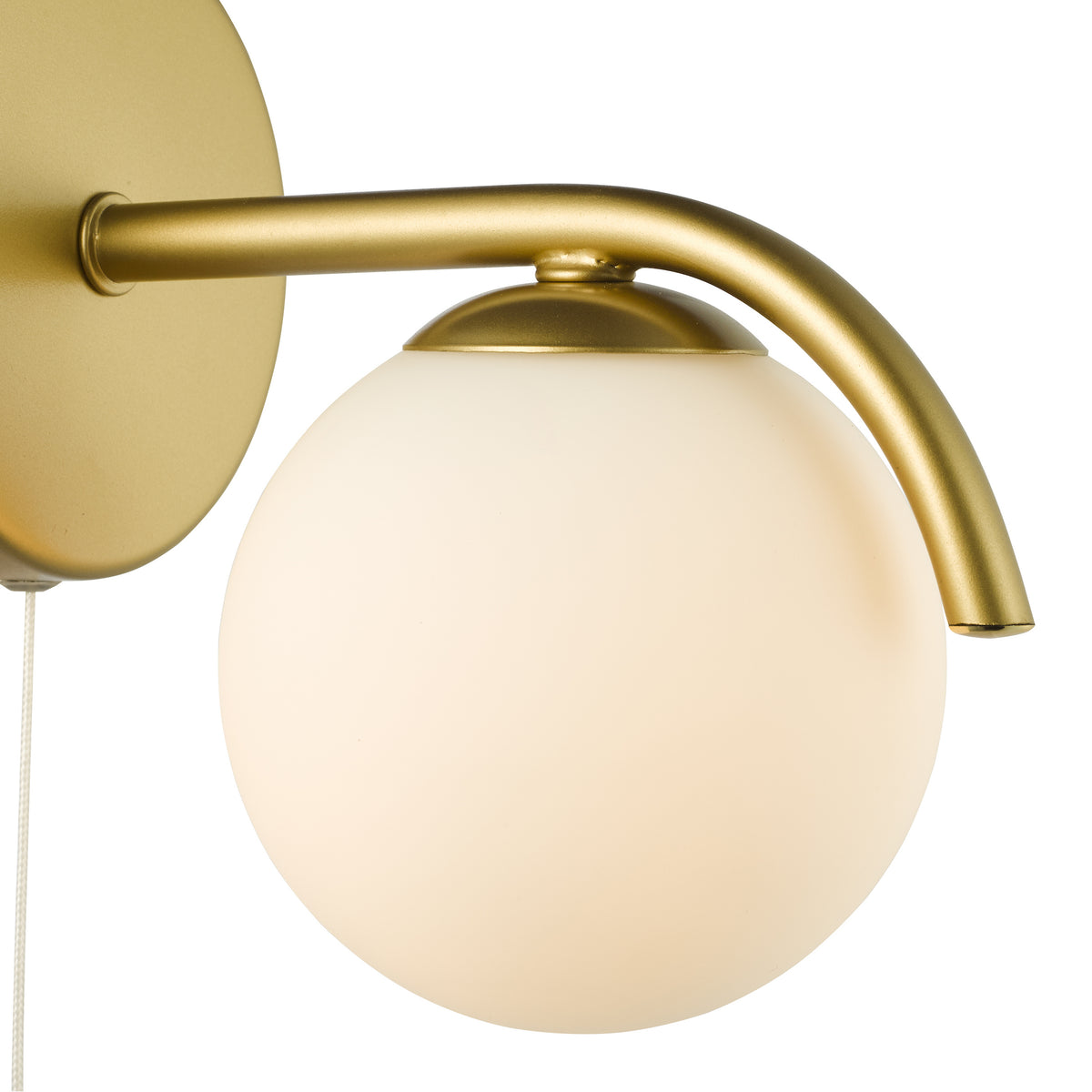 Gold wall sconce with a spherical white glass shade and a pull chain switch