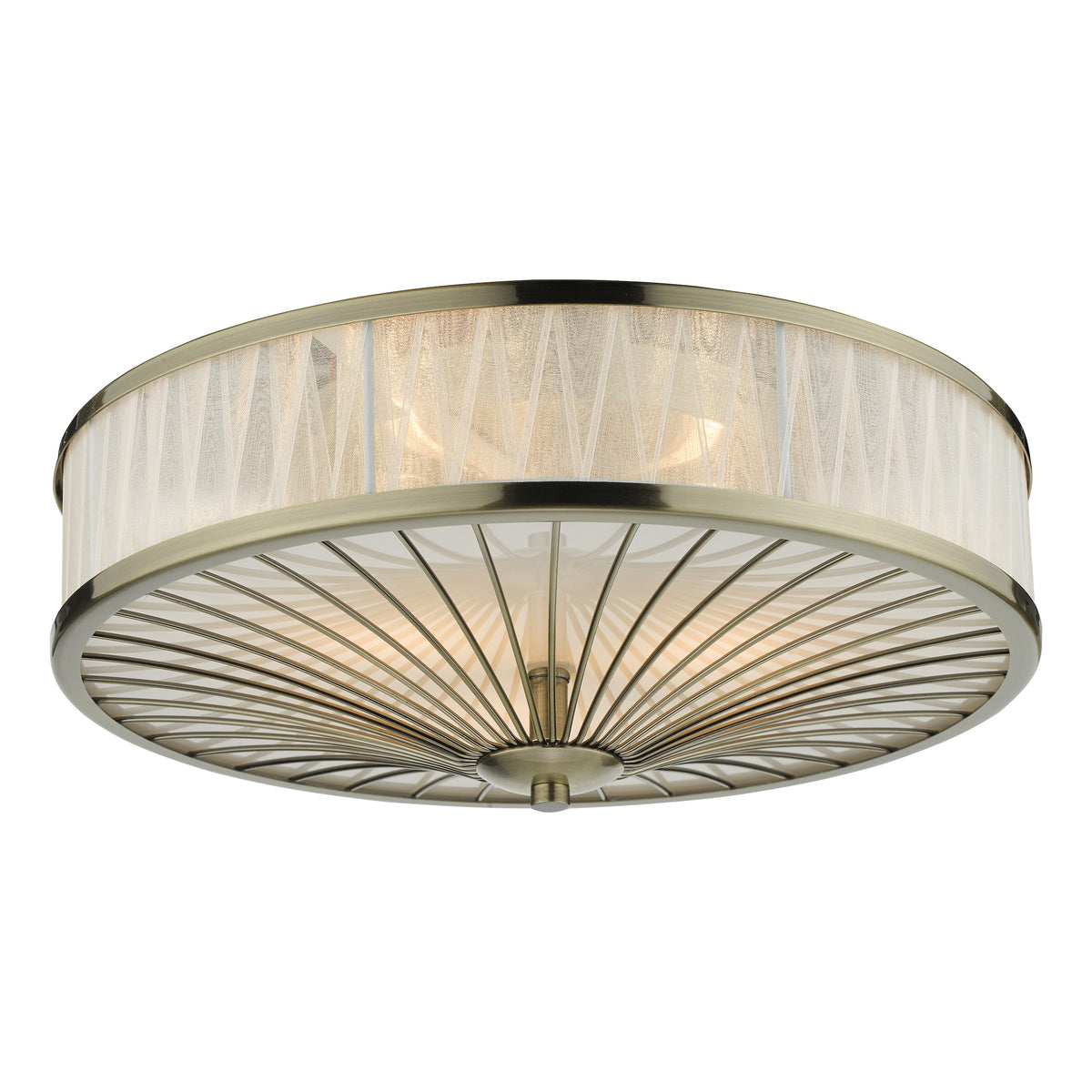 Round ceiling light with an antique brass finish and a sheer fabric shade
