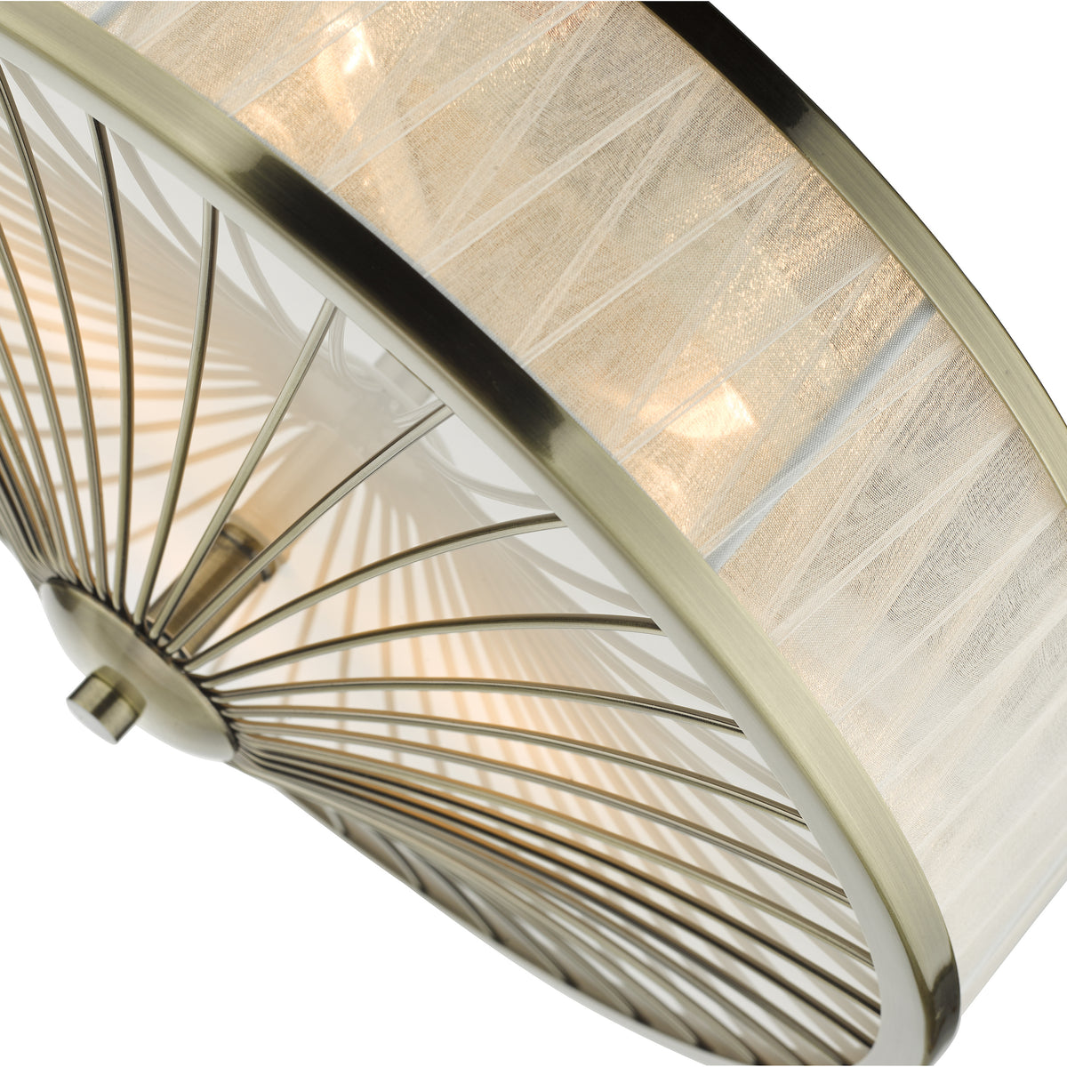 Close up of a ceiling light with a bronze frame and a sheer fabric shade
