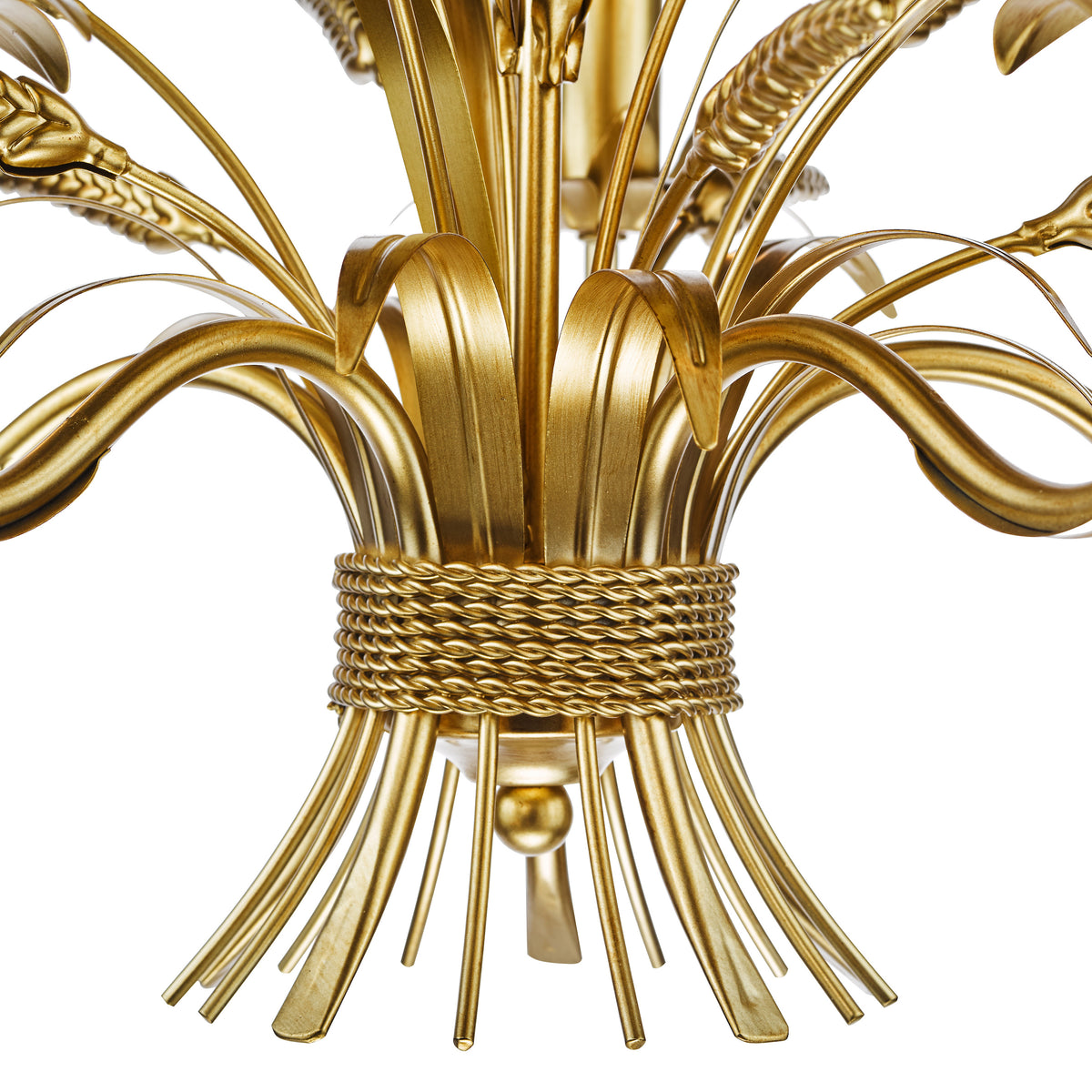 Close up of a gold chandelier base with a rope-like design and wheat stalk accents