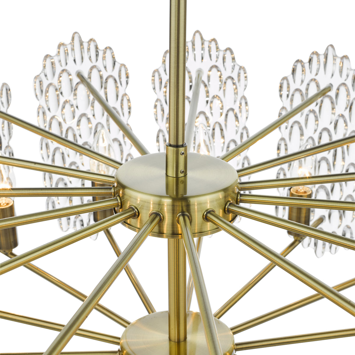 Close up of a brass chandelier with clear glass accents