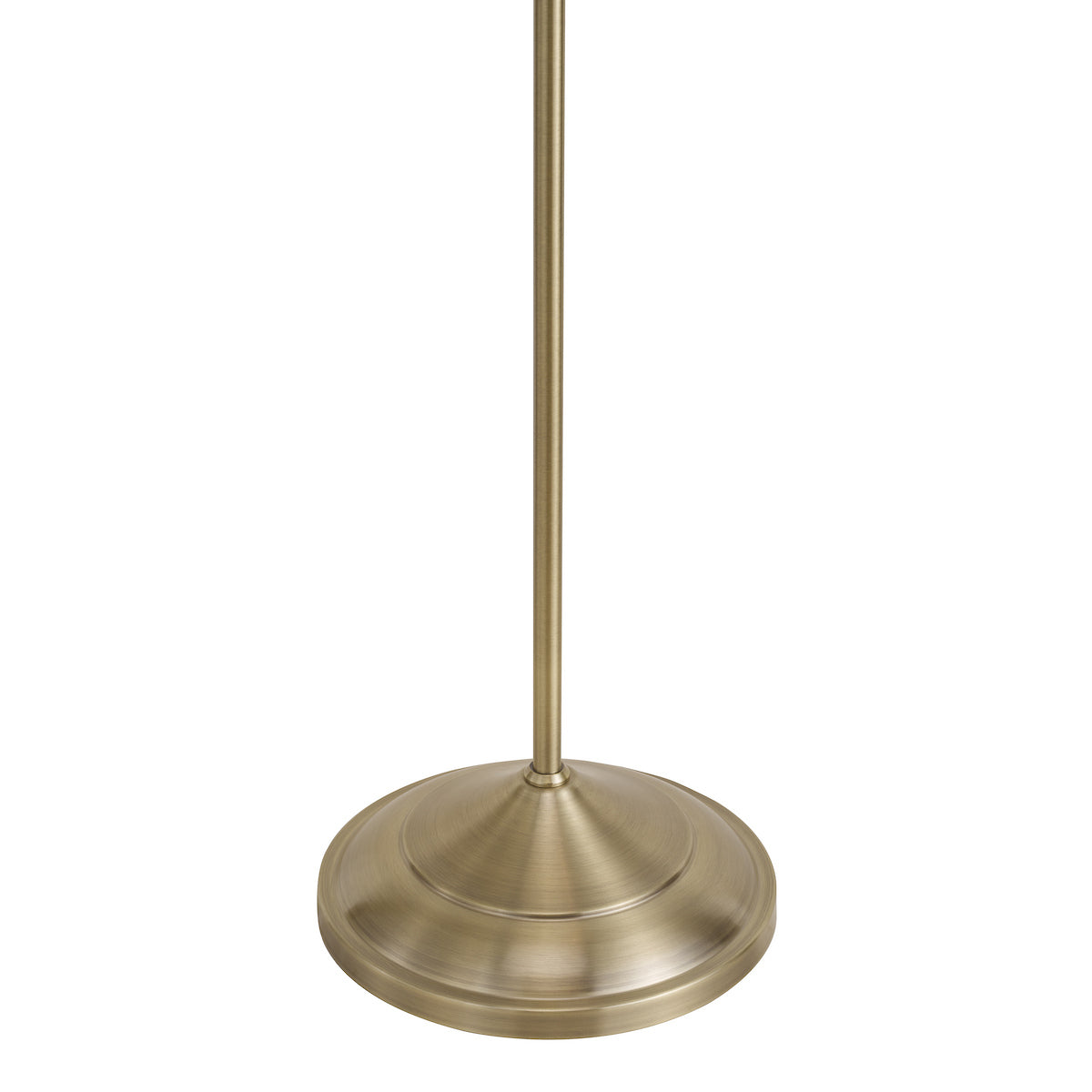 A close-up of a brass lamp base and pole on a white background.