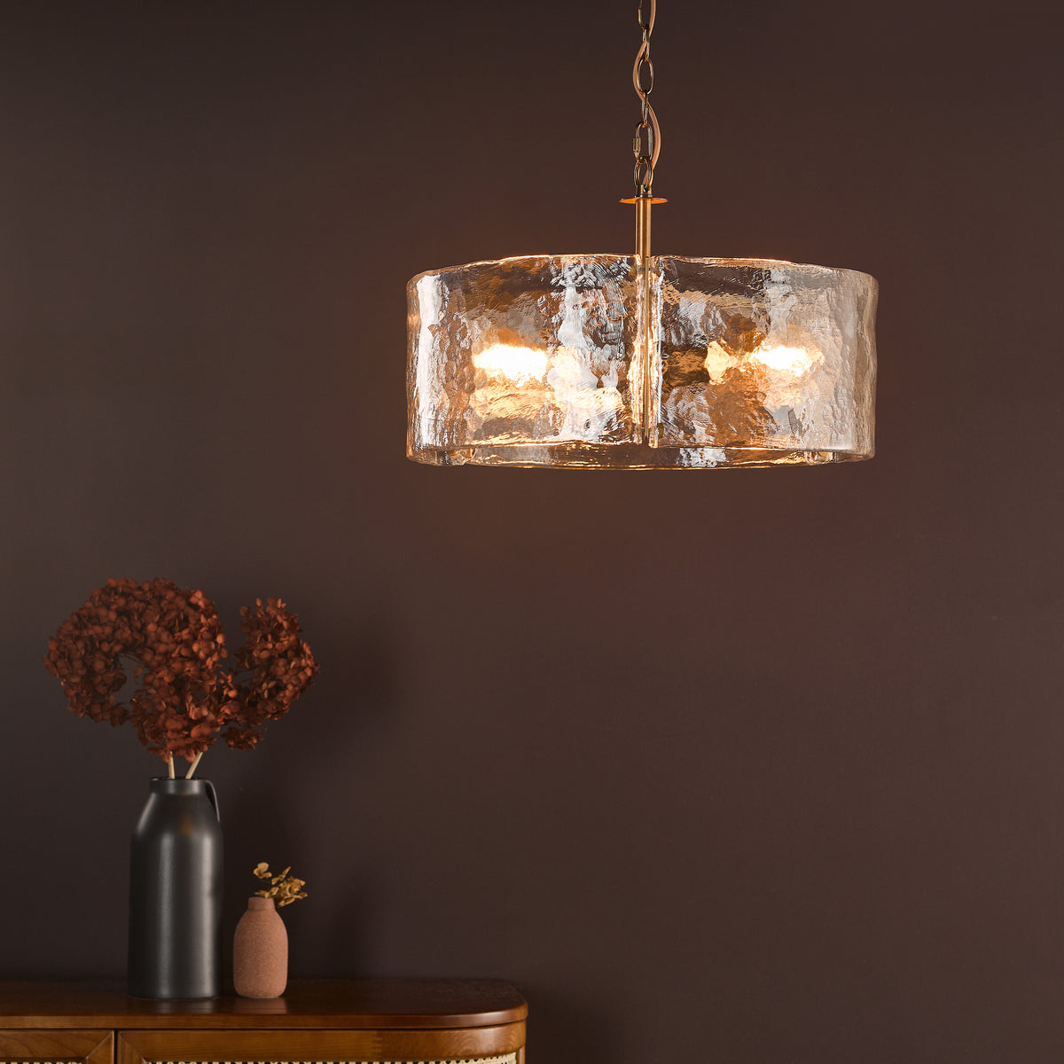 Ravis Three Light Pendant in Antique Bronze and Textured Glass Shades