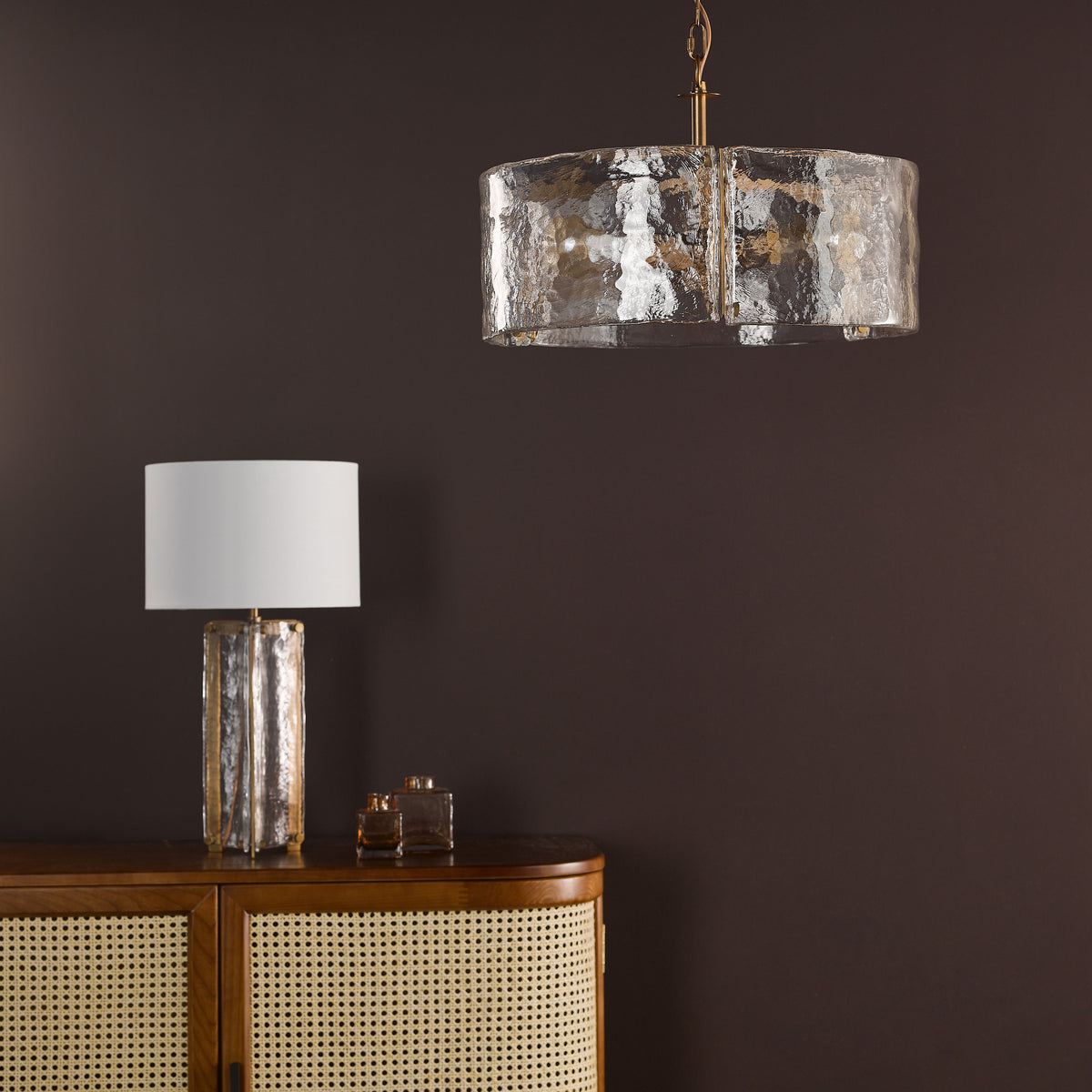 Ravis Three Light Pendant in Antique Bronze and Textured Glass Shades