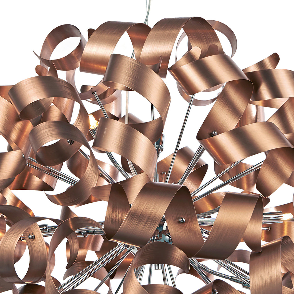 Close-up of a modern chandelier with spiraling copper ribbons and exposed bulbs.