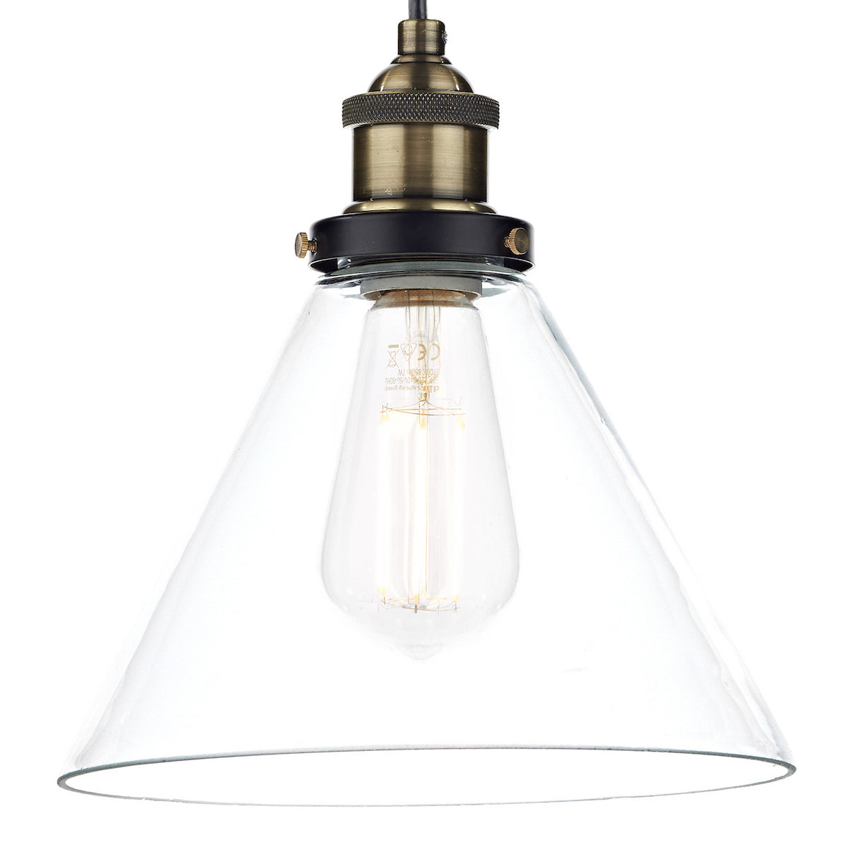 Clear glass cone pendant light with an Edison bulb and antique brass fitting.