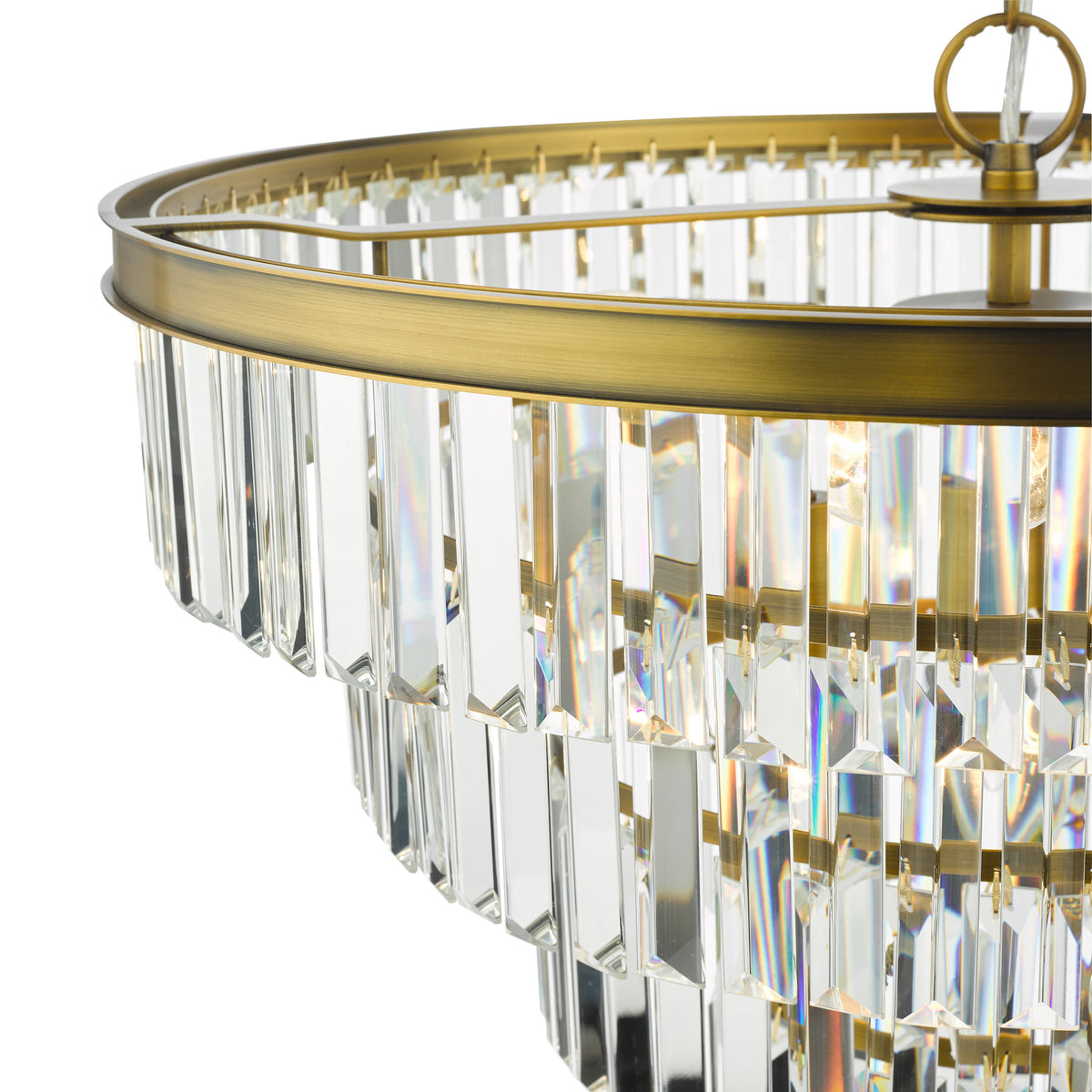 Close up of a tiered chandelier with rectangular crystal prisms and an antique brass frame