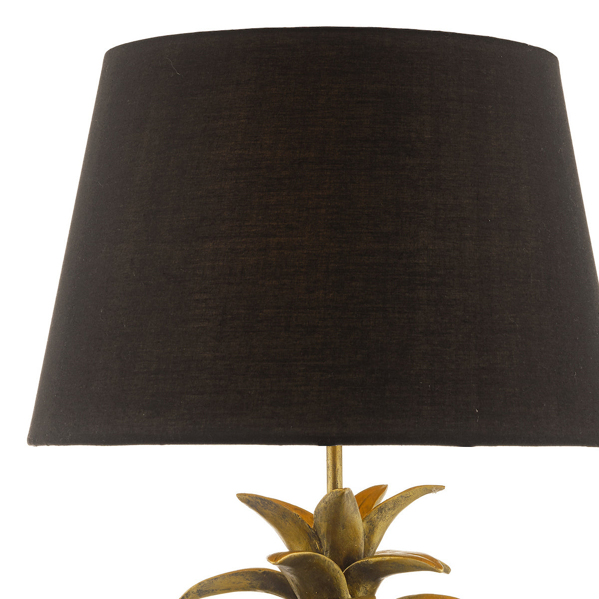 Black lamp shade with a gold pineapple base.