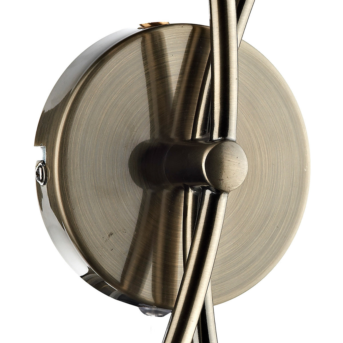 Close-up of a bronze-colored metal wall sconce base with two curved arms.
