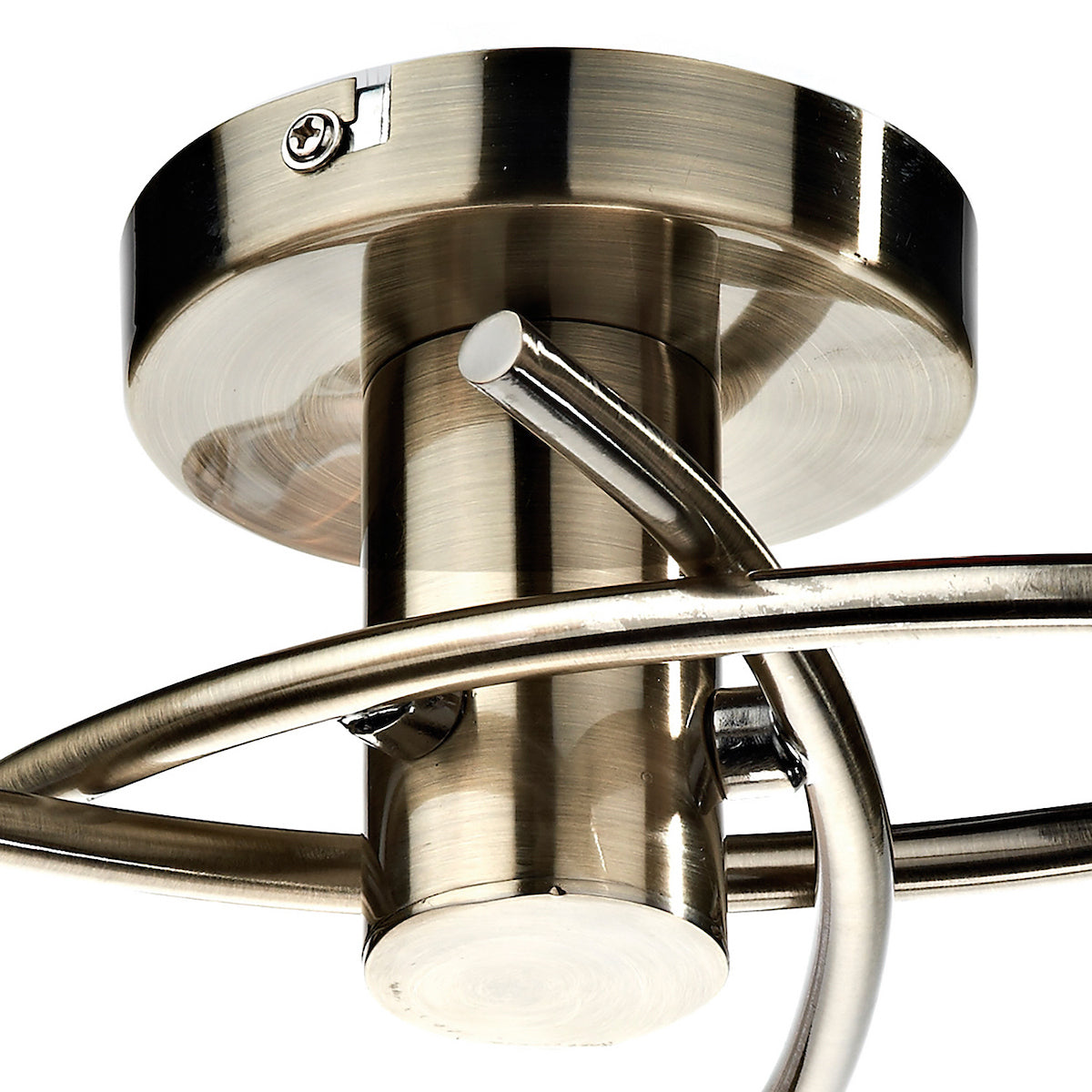 Close-up of a bronze ceiling light fixture with a spiral design.