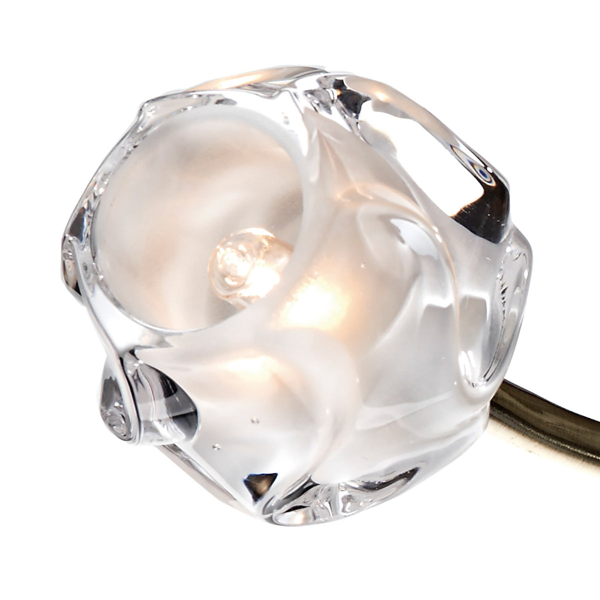 Close-up of a clear and frosted glass light fixture with a glowing bulb inside.