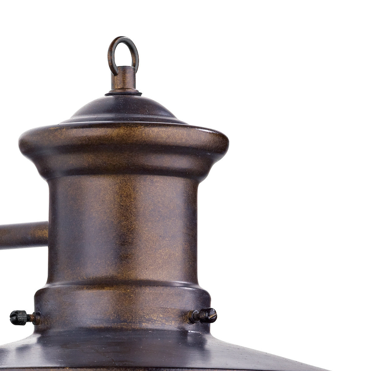 Close-up of a bronze outdoor light fixture with a hanging loop and decorative screws.