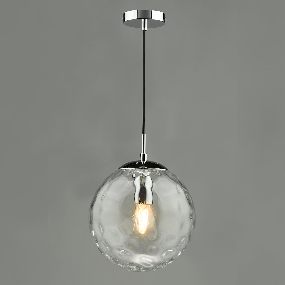 Textured glass globe pendant light with a chrome finish and an exposed filament bulb.