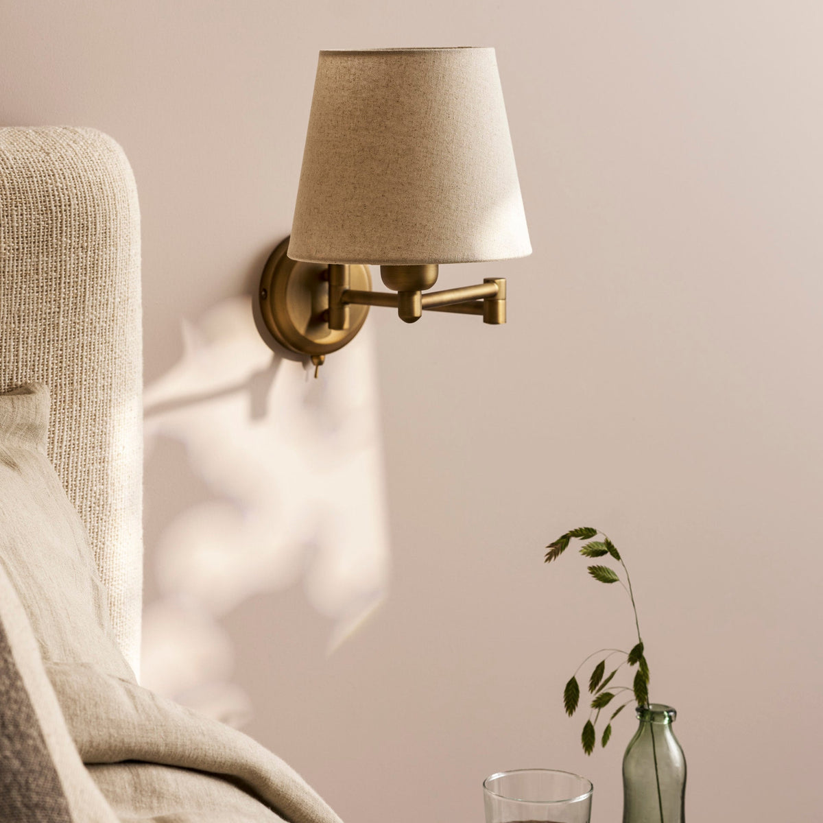 Peartree Single Swing Arm Switched Wall Light in Antique Bronze