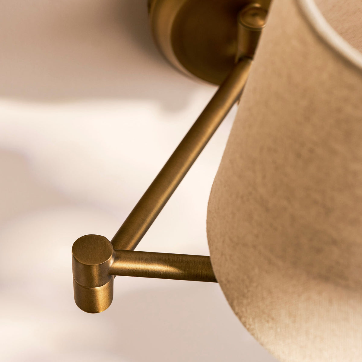 Peartree Single Swing Arm Switched Wall Light in Antique Bronze