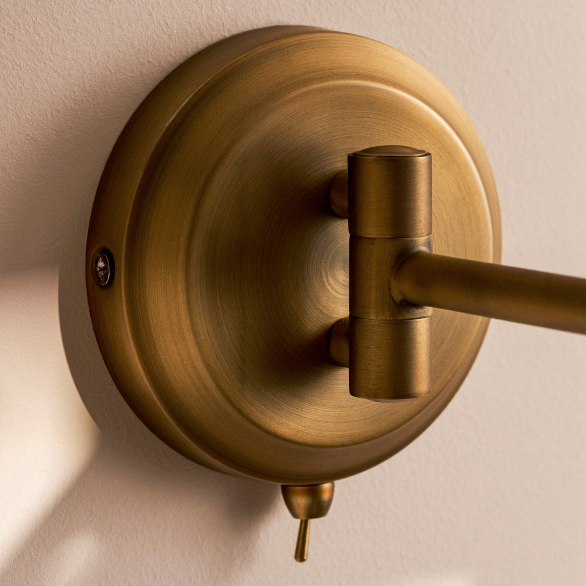Peartree Single Swing Arm Switched Wall Light in Antique Bronze by Garden Trading Lighting