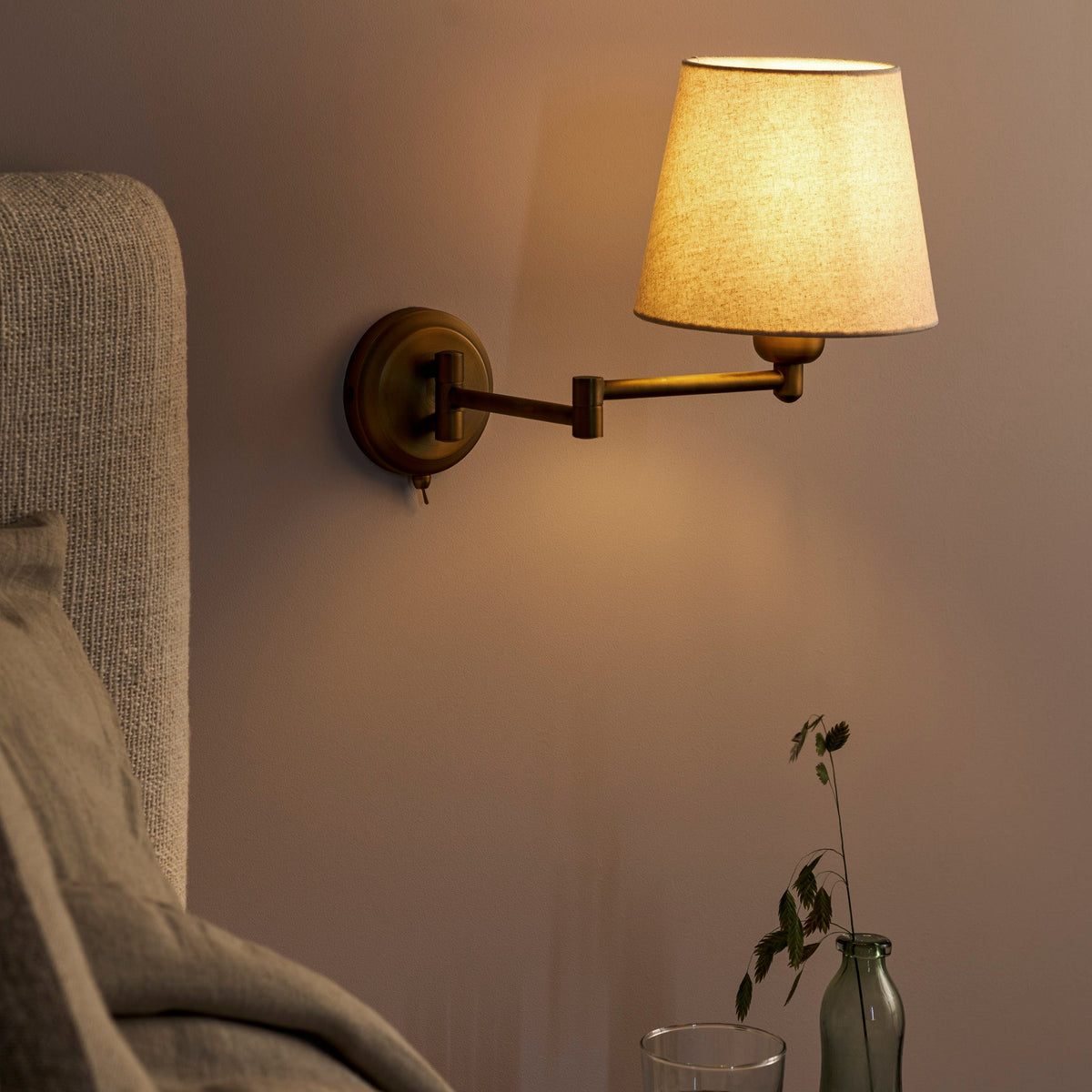 Peartree Single Swing Arm Switched Wall Light in Antique Bronze