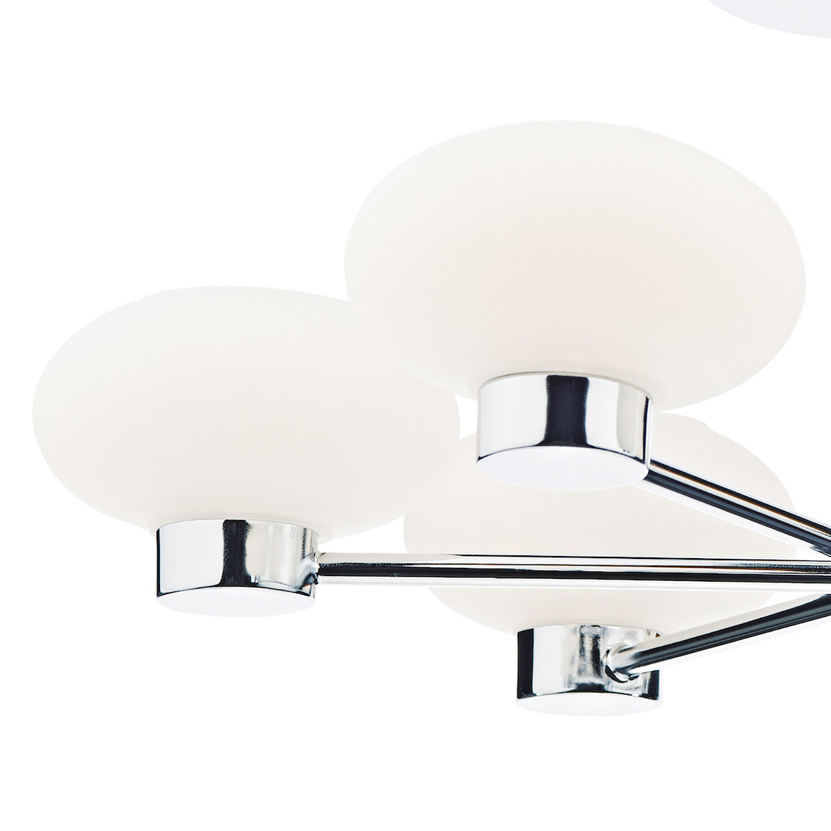 Close-up of a modern chandelier with multiple white spherical glass shades and chrome accents.