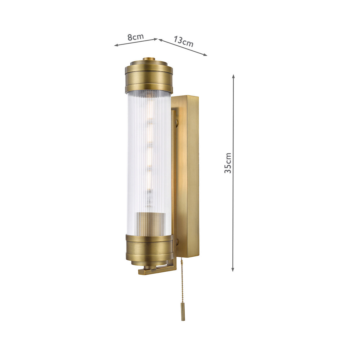 Brass wall light with a cylindrical fluted glass shade and pull chain switch, dimensions 35cm by 8cm by 13cm