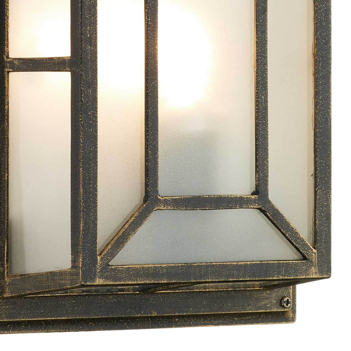 Close-up of a rustic outdoor wall light with frosted glass and a distressed bronze finish.