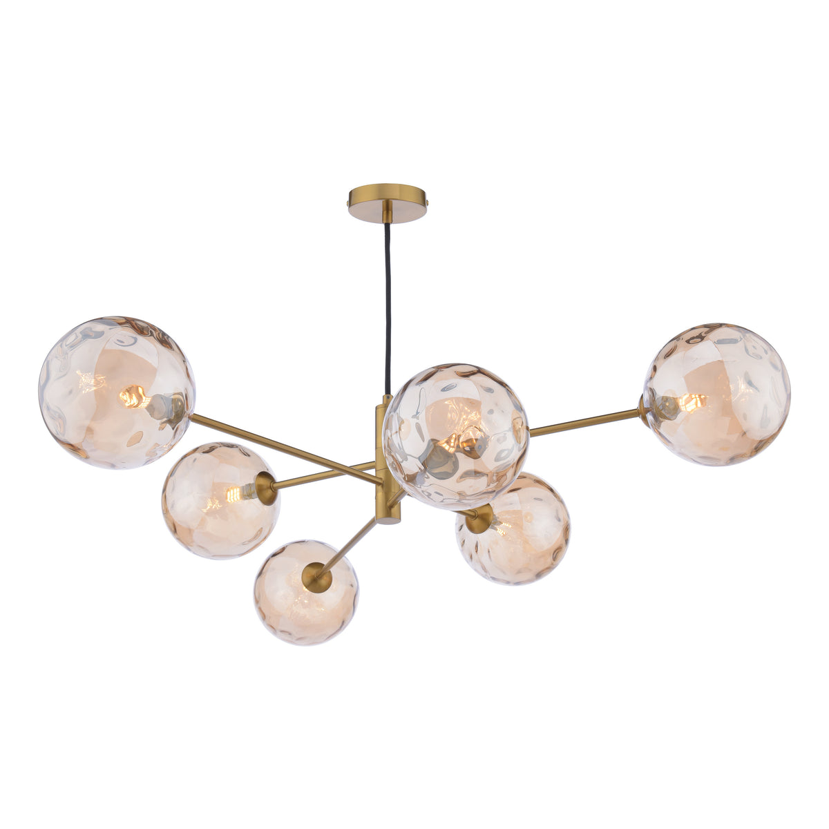 Modern brass chandelier with six amber textured glass globes, each containing an exposed light bulb.