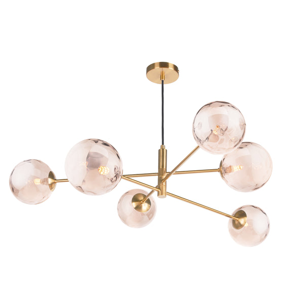 Modern brass chandelier with six amber glass globes, each containing a visible light bulb, on a white background.