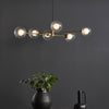 Vignette Six Light Pendant In Aged Brass with Clear & Opal Glass Shades
