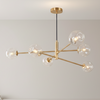 Vignette Six Light Pendant In Aged Brass with Organic Amber Glass Shades