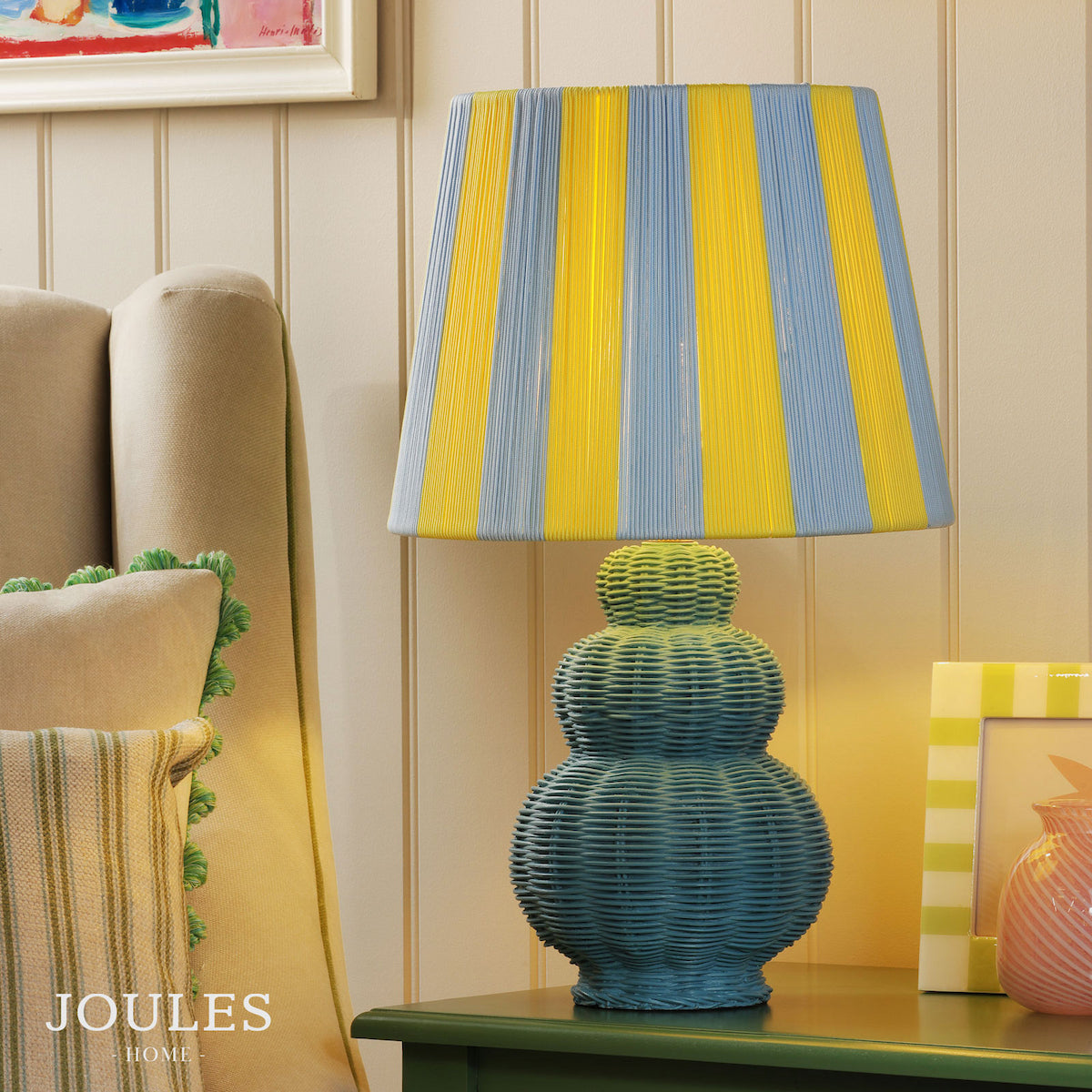 Joules Home table lamp with a blue and yellow striped shade and a blue woven tiered base