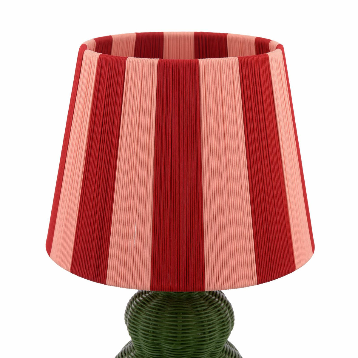 Joules Whitby table lamp with a matt green base and a red and pink striped fabric shade