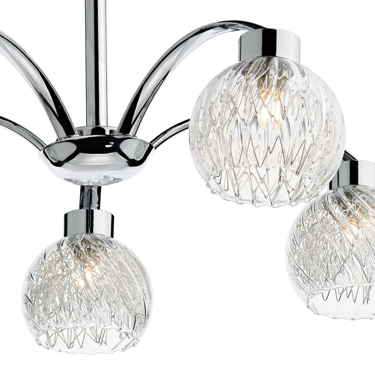 Close-up of a modern chandelier with chrome arms and three textured glass globe shades.