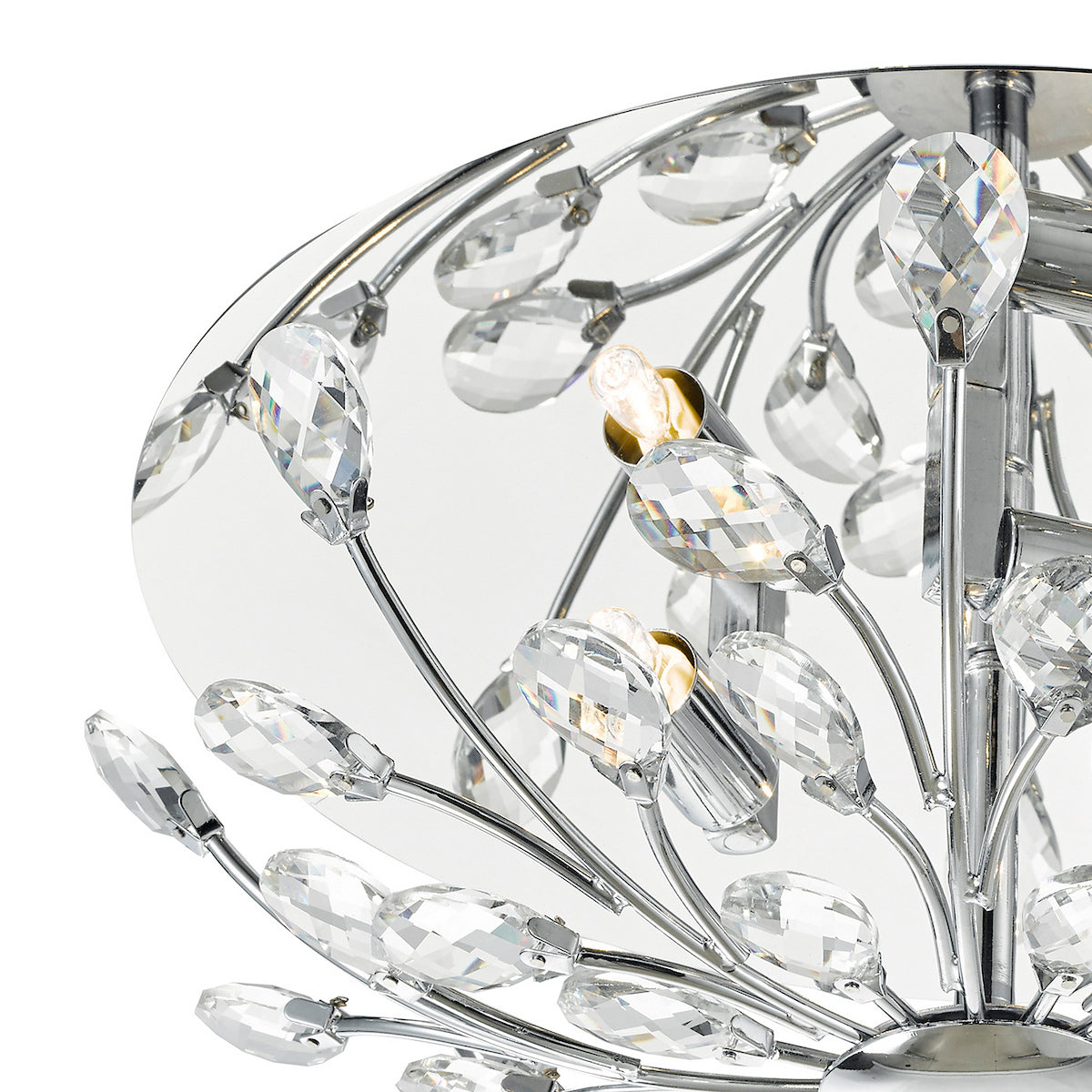 Close-up of a modern chrome chandelier with numerous faceted crystal drops and exposed bulbs.