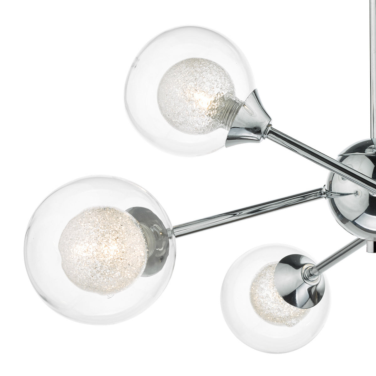 Close-up of a modern chandelier with clear glass globes and sparkling inner bulbs.