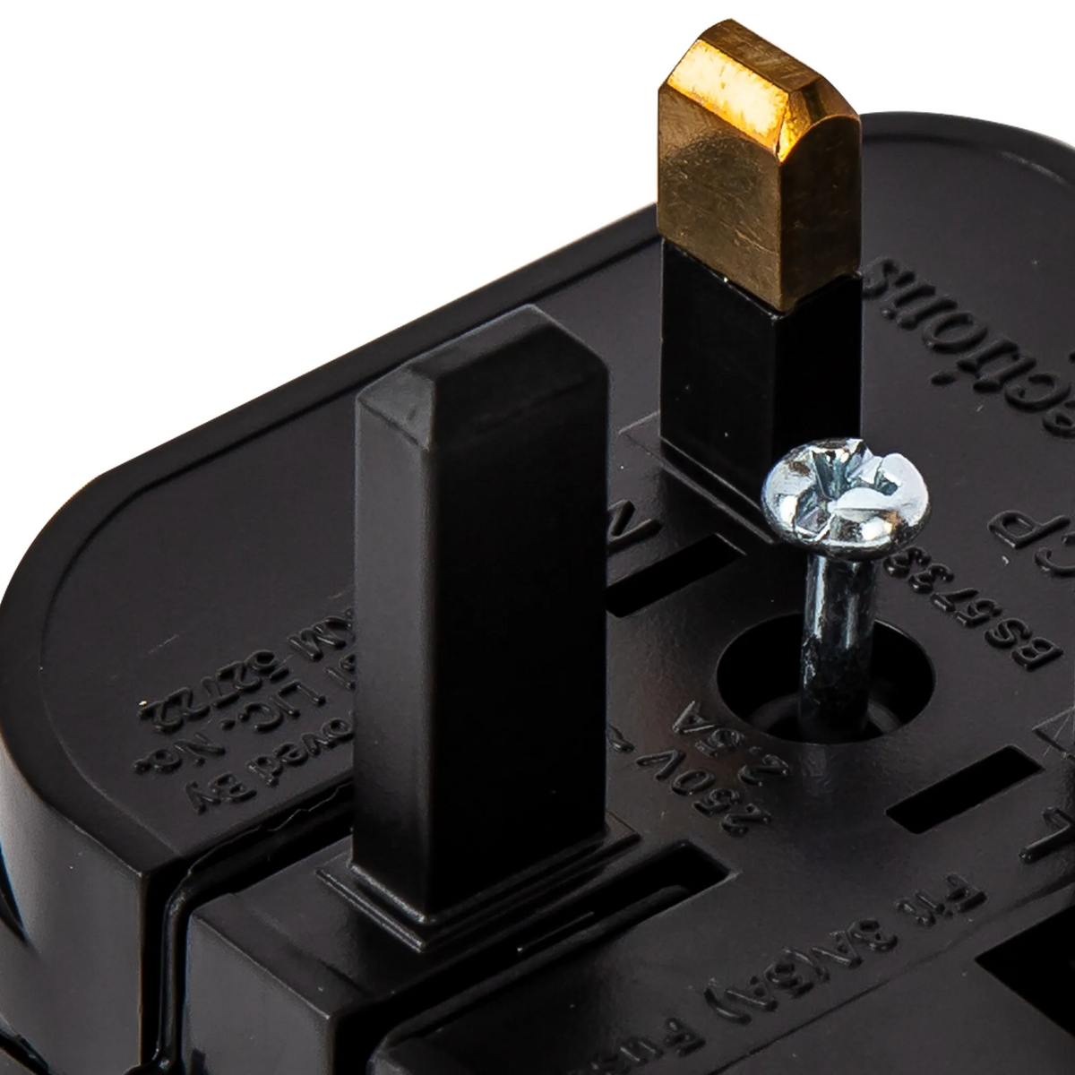 Close up of a black UK plug with a brass live pin and a silver screw