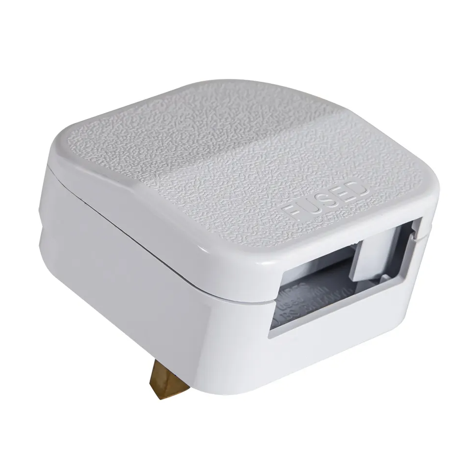 White fused electrical plug with a textured top surface and visible fuse slot