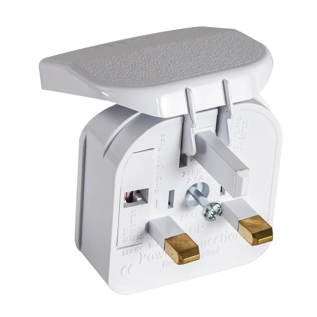 White travel adapter with three brass-tipped pins and a hinged cover