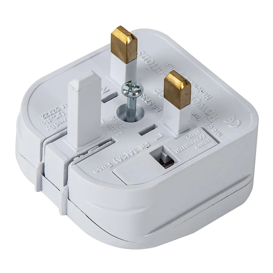 White UK travel adapter with three brass pins and a silver screw