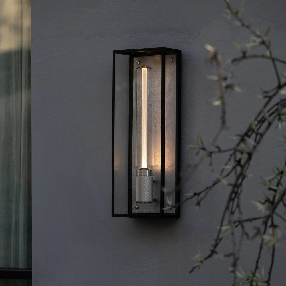 Black rectangular outdoor wall light with a vertical tubular bulb